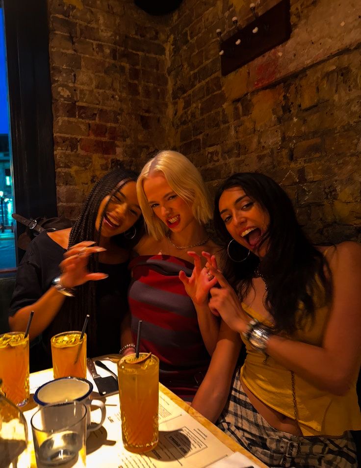 Girls posing at dinner